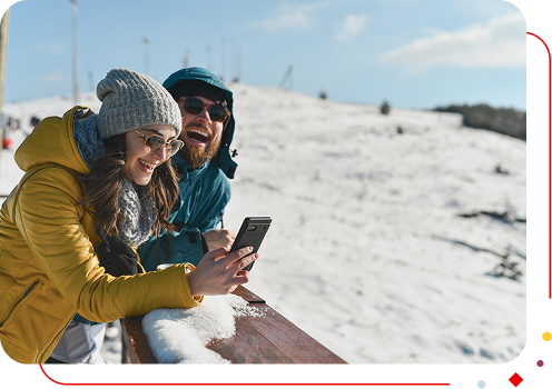 Couple sur une piste de ski